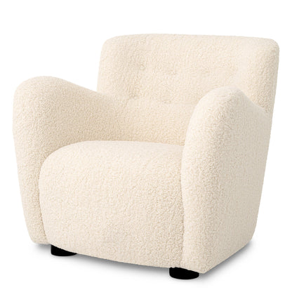 This Contemporary Chair by Tara Shaw piece provides a perfect spot to cozy up and unwind. 