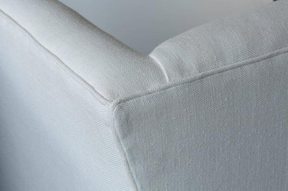 Contemporary Linen Sofa with Iron Base by Tara Shaw close up view of piping